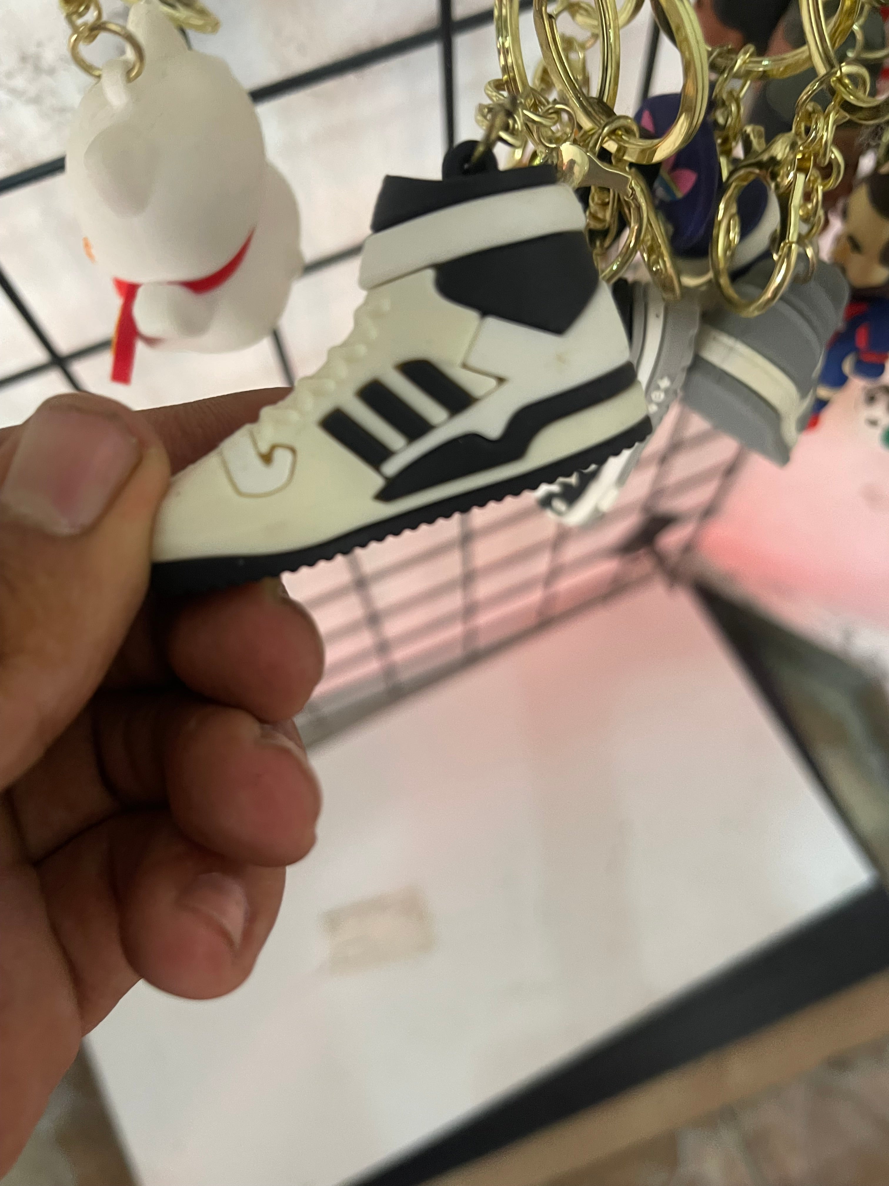 White/blue sneakers keychain