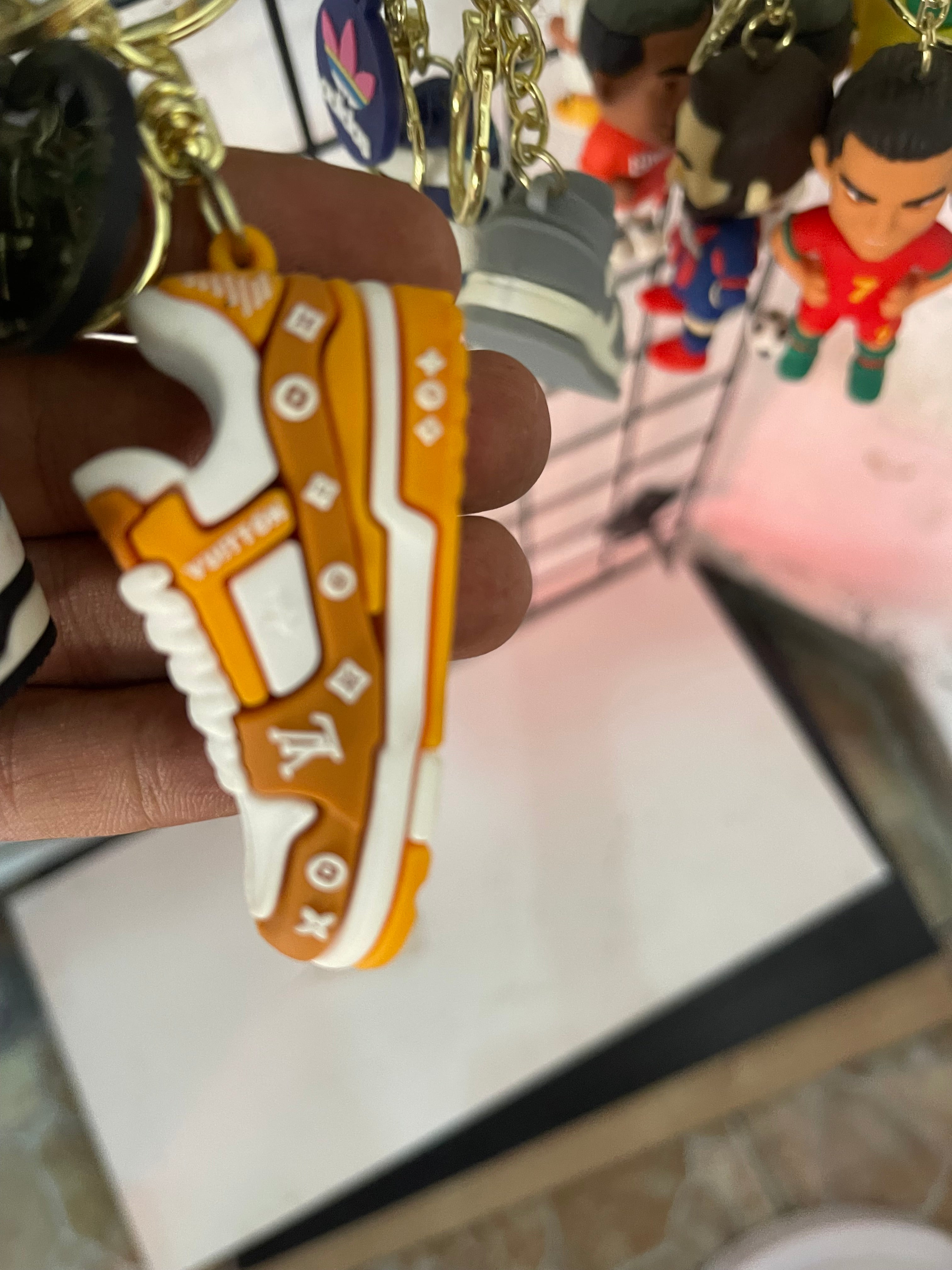 Lv keychain Gold